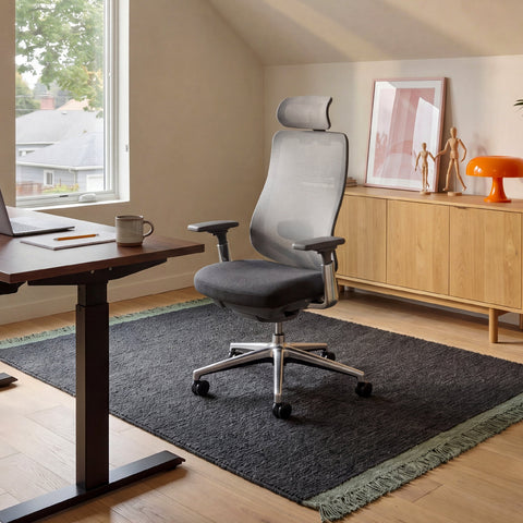 COLAMY ATLAS Dark Gray Ergonomic High-Back Mesh Office Chair in a Warm Home Office with a Standing Desk