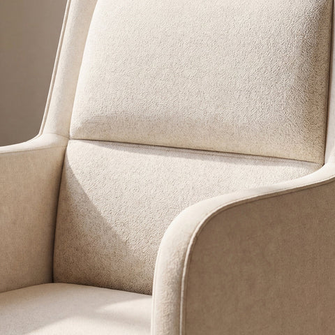 Close-up of the textured Beige upholstery, padded backrest, seat, and curved armrest of the COLAMY COCOON Swivel Office Chair