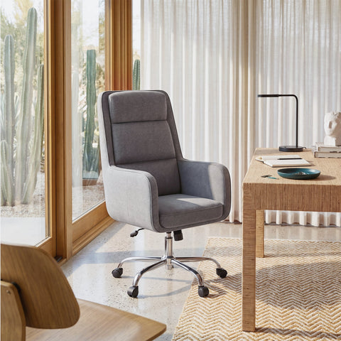 COLAMY COCOON Dark Gray High-Load Cloud Comfort Swivel Office Chair beside a wooden desk in a sunlit modern home office