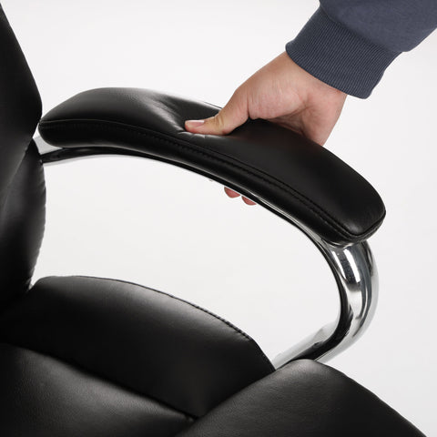 Close-up of COLAMY MARCUS Office Chair's Padded Leather Armrest with Chrome Frame